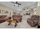 Living room with a view of the kitchen and an open floor plan at 628 Erin Way, Brooksville, FL 34601
