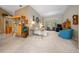 Spacious living area with a sectional sofa, and a view into the dining area at 628 Erin Way, Brooksville, FL 34601