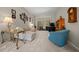 Living room with a sectional sofa and sliding glass doors leading to the pool at 628 Erin Way, Brooksville, FL 34601
