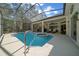 Relaxing pool and spa with screened enclosure at 628 Erin Way, Brooksville, FL 34601