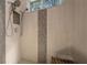 Large walk-in shower with multiple shower heads and a built-in bench at 628 Erin Way, Brooksville, FL 34601