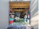 Organized storage shed with shelving and generator at 628 Erin Way, Brooksville, FL 34601