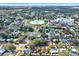 Wide aerial view showing home's location near a circular lake at 7095 17Th N Way, St Petersburg, FL 33702