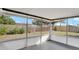 Spacious screened porch offers views of the backyard at 7095 17Th N Way, St Petersburg, FL 33702