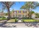 Beautiful two-story house with lush landscaping and a brick pathway at 740 13Th N Ave, St Petersburg, FL 33701