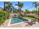 Inviting rectangular pool, lush landscaping at 740 13Th N Ave, St Petersburg, FL 33701