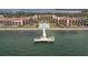 Aerial view of waterfront condo community with pool and private dock at 7520 Sunshine Skyway S Ln # T18, St Petersburg, FL 33711