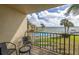 Private balcony overlooking the pool and water at 7520 Sunshine Skyway S Ln # T18, St Petersburg, FL 33711
