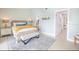 Main bedroom with a comfy bed and plenty of natural light at 7520 Sunshine Skyway S Ln # T18, St Petersburg, FL 33711