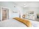 Bedroom with a large bed and access to a bathroom at 7520 Sunshine Skyway S Ln # T18, St Petersburg, FL 33711