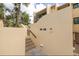 Condo building with stairs leading to units at 7520 Sunshine Skyway S Ln # T18, St Petersburg, FL 33711