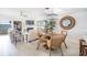 Dining room with round table and chairs at 7520 Sunshine Skyway S Ln # T18, St Petersburg, FL 33711