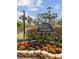 Seapointe community entrance with beautiful landscaping at 7520 Sunshine Skyway S Ln # T18, St Petersburg, FL 33711