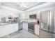 Modern kitchen, stainless steel appliances, granite counters at 7520 Sunshine Skyway S Ln # T18, St Petersburg, FL 33711