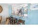 Modern kitchen with granite countertops and stainless steel appliances at 7520 Sunshine Skyway S Ln # T18, St Petersburg, FL 33711