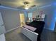 Bright bedroom with a comfortable bed and en-suite bathroom at 8365 Capstone Ranch Dr, New Port Richey, FL 34655