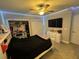 Comfortable bedroom with TV and ample storage at 8365 Capstone Ranch Dr, New Port Richey, FL 34655