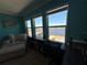 Bright bedroom with water views and built-in workspace at 8365 Capstone Ranch Dr, New Port Richey, FL 34655