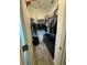 Spacious walk-in closet with shelving and hanging rods at 8365 Capstone Ranch Dr, New Port Richey, FL 34655