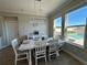 Bright dining room with view of pool and backyard at 8365 Capstone Ranch Dr, New Port Richey, FL 34655