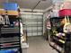 Organized garage with storage shelving and overhead storage at 8365 Capstone Ranch Dr, New Port Richey, FL 34655
