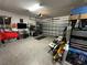 Garage with storage shelving and ample space at 8365 Capstone Ranch Dr, New Port Richey, FL 34655