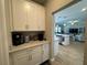 Bright and spacious pantry with coffee bar at 8365 Capstone Ranch Dr, New Port Richey, FL 34655