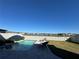 Refreshing pool and patio overlooking a lake at 8365 Capstone Ranch Dr, New Port Richey, FL 34655