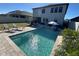 Sparkling pool with patio and lounge chairs at 8365 Capstone Ranch Dr, New Port Richey, FL 34655