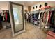 Spacious walk-in closet with ample shelving and hanging space at 8365 Capstone Ranch Dr, New Port Richey, FL 34655