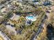 Aerial view of community amenities, including pool and tennis courts at 9626 Charlesberg Dr, Tampa, FL 33635