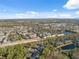 Aerial view showcasing community and surrounding area at 9626 Charlesberg Dr, Tampa, FL 33635