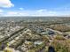 Large community view with pool, tennis courts, and homes at 9626 Charlesberg Dr, Tampa, FL 33635