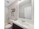 Bathroom with white vanity, large mirror, and bathtub at 9626 Charlesberg Dr, Tampa, FL 33635