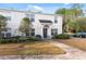 Clean lines and a welcoming front entrance enhance this two-story townhome at 9626 Charlesberg Dr, Tampa, FL 33635