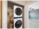 Laundry closet with stackable washer and dryer at 9626 Charlesberg Dr, Tampa, FL 33635