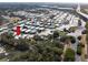 Aerial view showcasing community location and waterfront at 9790 66Th N St # 130, Pinellas Park, FL 33782