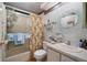 Clean bathroom with shower/tub combo and updated vanity at 9790 66Th N St # 130, Pinellas Park, FL 33782