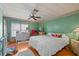Bright bedroom featuring a comfortable bed and ample closet space at 9790 66Th N St # 130, Pinellas Park, FL 33782
