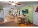 Small dining area with table and chairs, open to the kitchen at 9790 66Th N St # 130, Pinellas Park, FL 33782