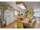 Bright kitchen features an island with seating and lots of storage at 9790 66Th N St # 130, Pinellas Park, FL 33782