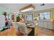 Kitchen boasts light wood island, white cabinets and a breakfast bar at 9790 66Th N St # 130, Pinellas Park, FL 33782