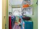 Convenient laundry room with washer, dryer and storage shelves at 9790 66Th N St # 130, Pinellas Park, FL 33782