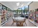 Community library with bookshelves and seating area at 9790 66Th N St # 130, Pinellas Park, FL 33782