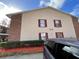 Exterior view of an apartment building with brick and siding at 21026 Voyager Blvd # 6, Land O Lakes, FL 34638