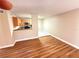 Kitchen with breakfast bar, wood cabinets, and appliances at 21026 Voyager Blvd # 6, Land O Lakes, FL 34638