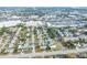 Aerial view showing the home's location in a residential neighborhood near shopping at 1004 Orlando Ave, Bradenton, FL 34207