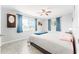 Main bedroom with ceiling fan and ample closet space at 1004 Orlando Ave, Bradenton, FL 34207