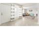 Entryway with a white door and striped curtains leading to the living room at 1004 Orlando Ave, Bradenton, FL 34207