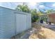 Detached shed with a large door for ample storage at 1004 Orlando Ave, Bradenton, FL 34207